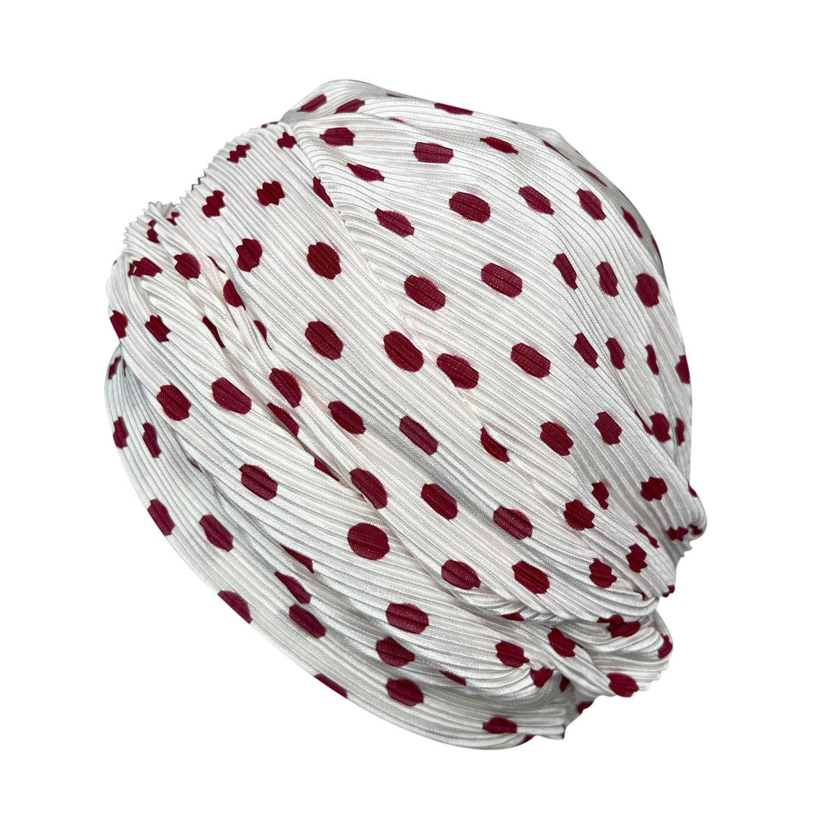 White headscarf with red polka dots on a white background